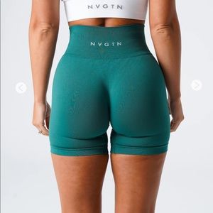 NVGTN emerald green seamless shorts